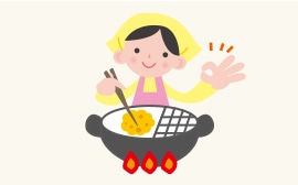 天ぷらを揚げる女性